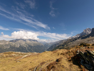 mountain landscape with pointed rock peaks in the distance