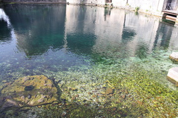 water flowing over dam