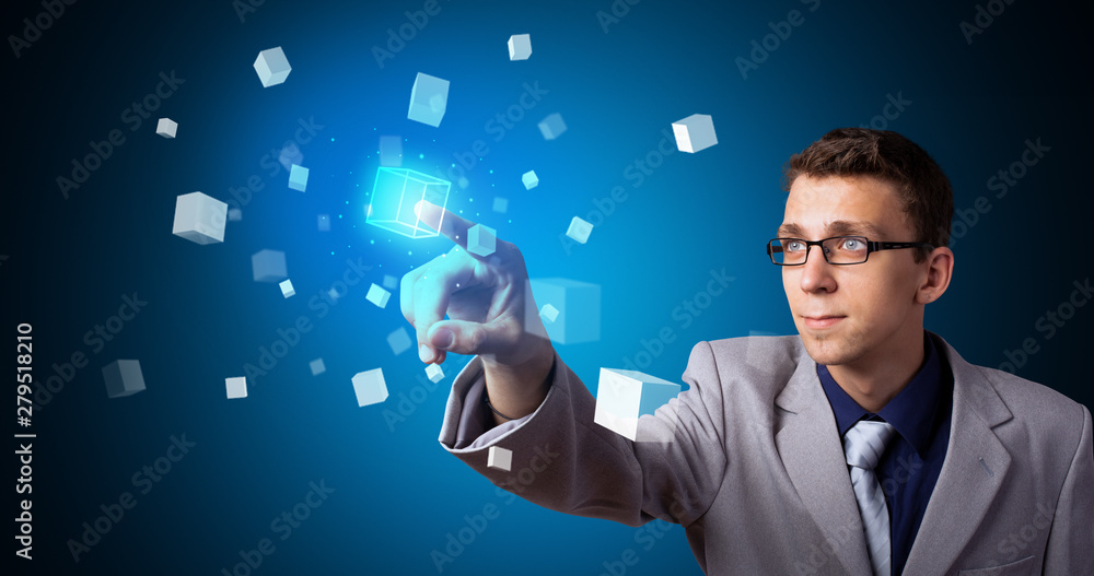 Poster Man touching hologram screen displaying cube symbols