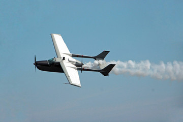 Fighter plane flying through the sky.