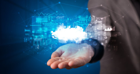 Obraz premium Person holding hologram screen displaying information from cloud based system