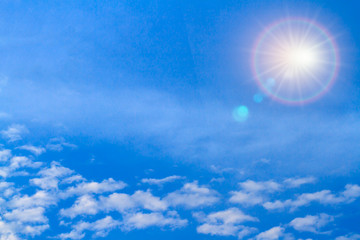 Naklejka na ściany i meble Fresh blue sky with soft and fluffy cloud. Brightness sky and white cloudy after raining with radiant sun halo background. Image for business target or meteorology presentation or inspiration concept.