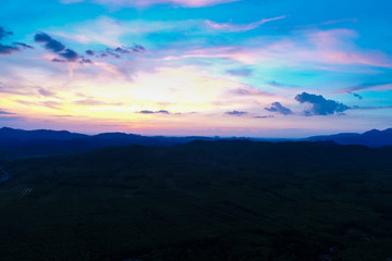 Amazing silhouette mountain sunset with colorful sky nature background