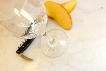 wineglas with sliced fruit 