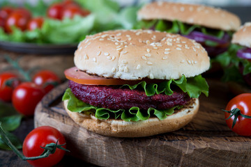 Vegetarian burgers with beetroot cutlet and vegetables
