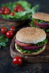 Vegetarian burgers with beetroot cutlet and vegetables
