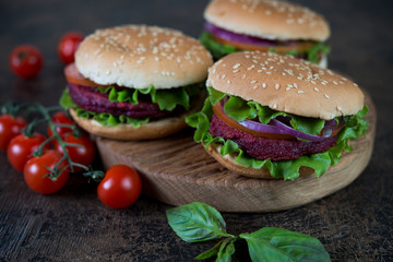 Vegetarian burgers with beetroot cutlet and vegetables