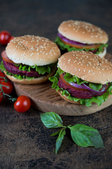 Vegetarian burgers with beetroot cutlet and vegetables