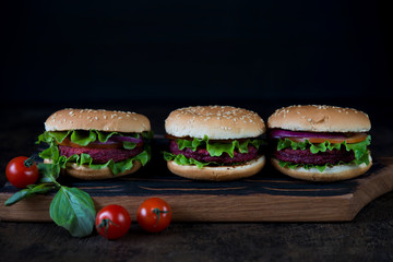 Vegetarian burgers with beetroot cutlet and vegetables