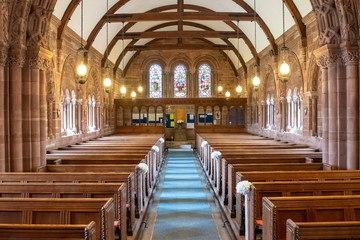 Inside view of a church looking up  the aisle - obrazy, fototapety, plakaty
