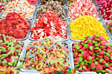 Confectionery shop at Carmel market in Tel Aviv, Israel. Colorful gumdrops and wine gum sweets. Market stall full of candys.