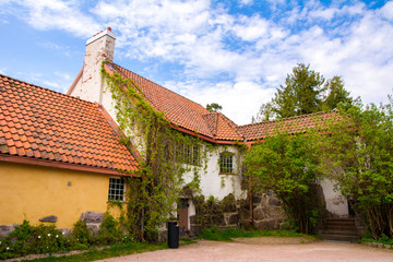 Fototapeta na wymiar View to the part of Hvitträsk manor and museum, spring, Kirkkonummi, Finland