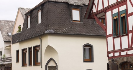 White gothic house with black roof tiles (Germany, Europe)