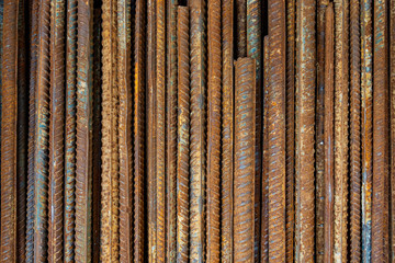 Top view stack of straight old rusty high yield stress deformed reinforcement steel or iron bars....