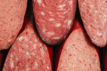 smoked sausage on wooden background