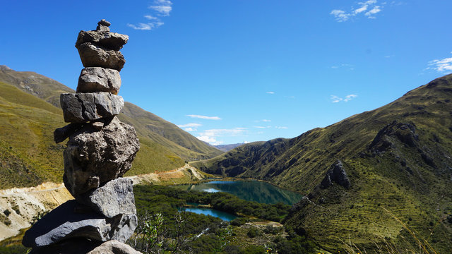  Apachetas stone tower over love forest in Vilca village, Peru