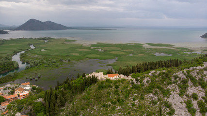 Fototapeta na wymiar Besac fortress overlooking Skadar lake in Virpazar, Montenegro.