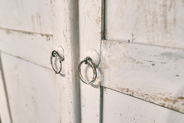 Grunge and white furniture in a bedroom
