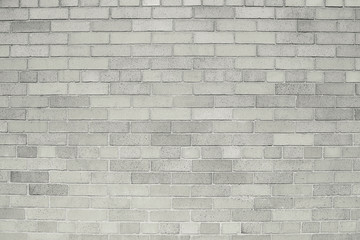 Old grey brick wall background texture