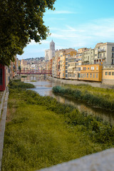 Girona's skyline with famous landmark cathedral and river houses