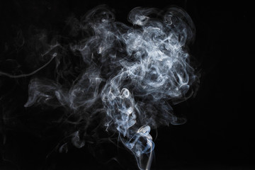 abstract white smoke isolated on dark background