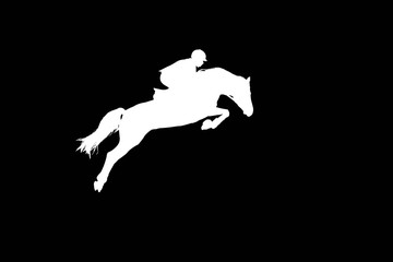 The rider on a horse jumping through a high barrier.