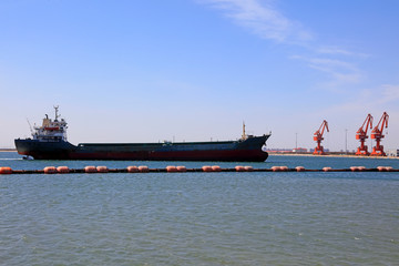 Cargo ships and dredging steel buoy