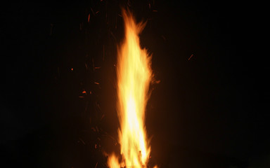 The flaming fire in the dark night floated a beautiful flame.