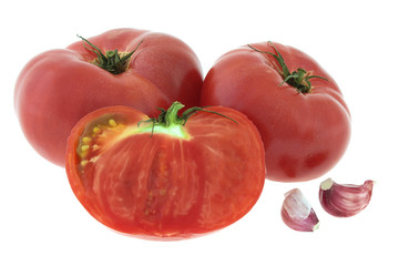 red tomatoes with garlic isolated on white background