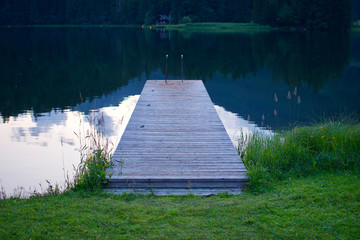 dark web wooden catwalk evening lake alpine footbrigde path bavaria germany relax meditation zen buddha silence