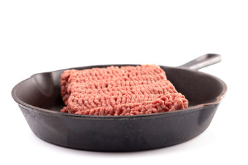 Raw Hamburger Meat in a Iron Skillet