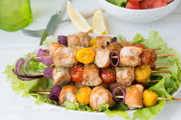 Chicken kebabs with vegetables on skewers