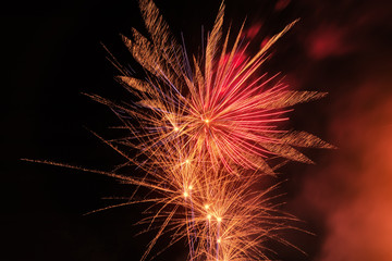 bright fireworks against a night sky / fireworks night photo