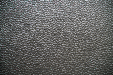 Luxury black genuine leather texture close up