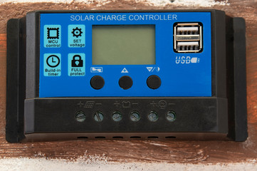 solar charge controller on brick wall