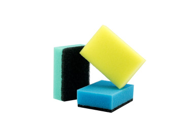 three sponges for washing dishes on a white background