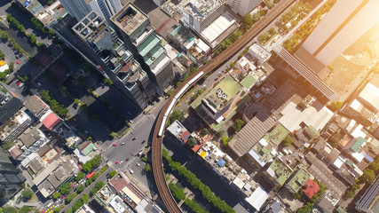 Fototapeta premium Aerial city view of Bangkok downtown, Flying over Bangkok, Thailand.