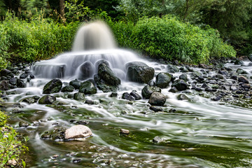 mixing zone of sewage discharge of urban sewage. river pollution. city dumps. artificial geyser....