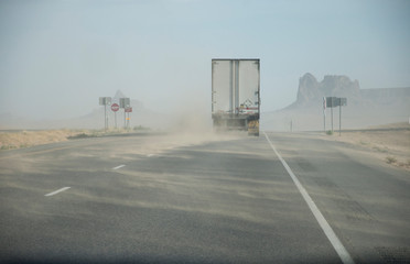Highway with truck in sand storm