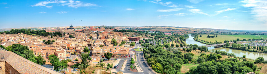 Fototapeta premium Panoramic cityscape of historic old town on Tagus River. Toledo, Spain