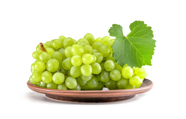 Green grape on plate isolated on white background