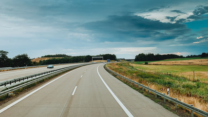 Fototapeta na wymiar Asphalt road and beautiful nature landscape