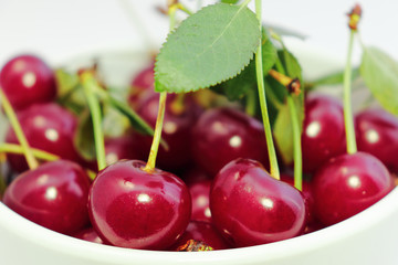 Bright colorful cherry berries on a white background