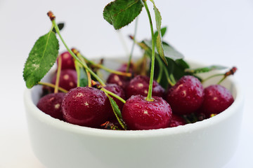 Bright colorful cherry berries on a white background