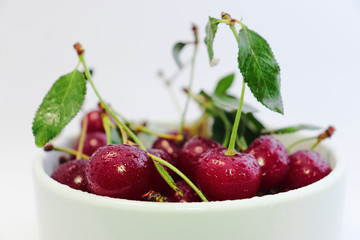 Bright colorful cherry berries on a white background