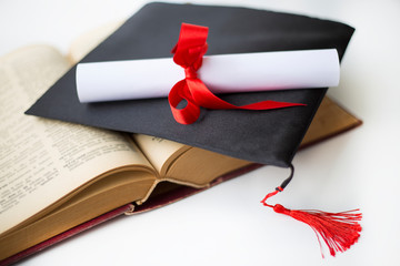 Black graduation cap and degree
