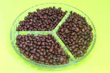 Red beans in bowl isolated on white background