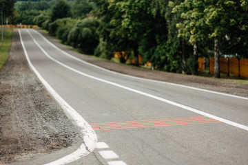 empty asphalt city road, defocusing road