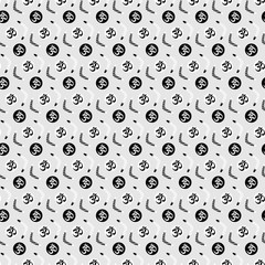 Conceptual, creative design of karma/ yin yang with the aum/om/ohm symbol and chevron patterned boomerangs in white and black