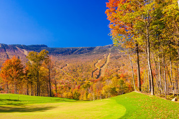 Stowe Mountain Resort ski trails during fall foliage season, Stowe Vermont, USA